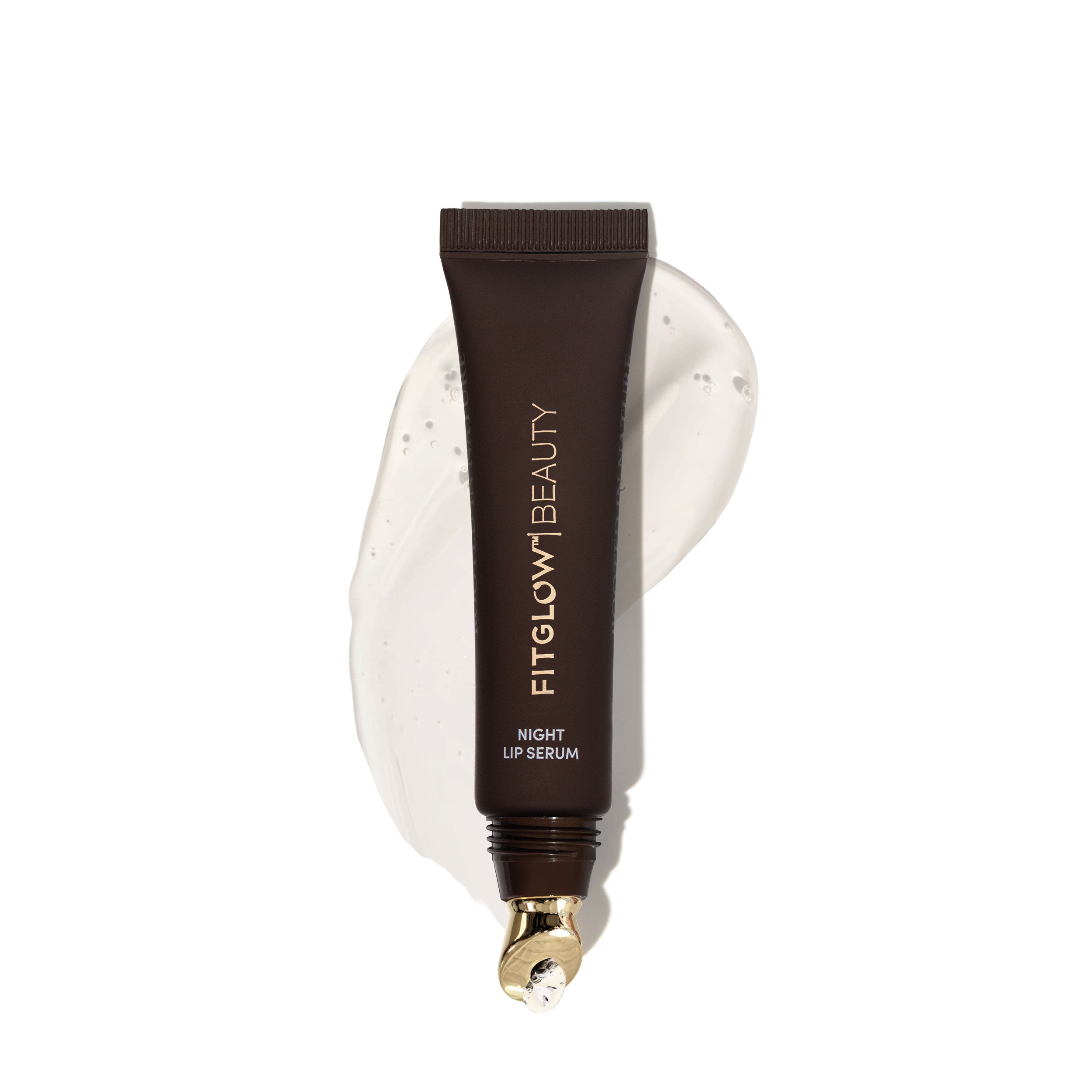 Fitglow Beauty Night lip serum tube on a white background