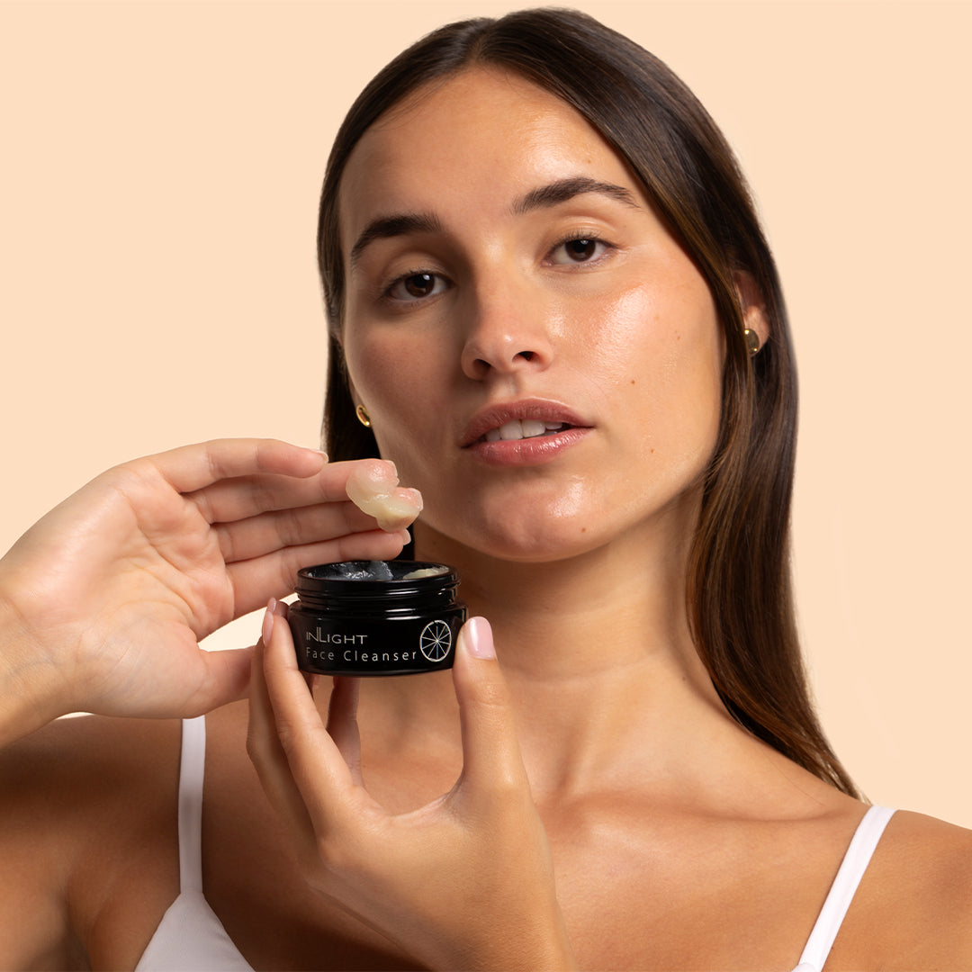 Inlight Beauty | Face Cleanser | Model Image_Oct26 - woman holding Inlight cleanser and showing its balm texture
