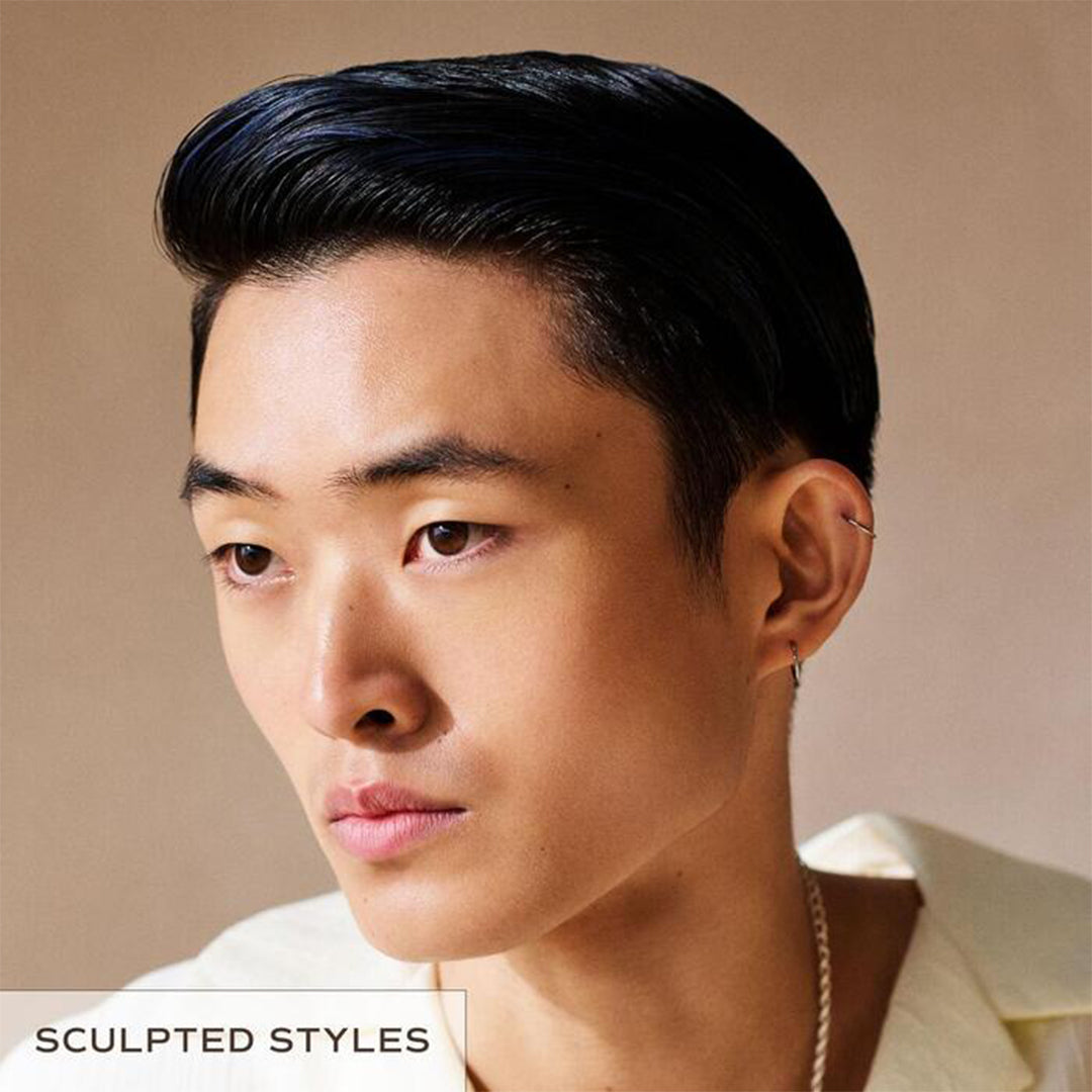 Innersense Organic Beauty | Inner Reflection Sculpting Pomade | Model Image 2 - model with sculpted slick hairstyle against a neutral background