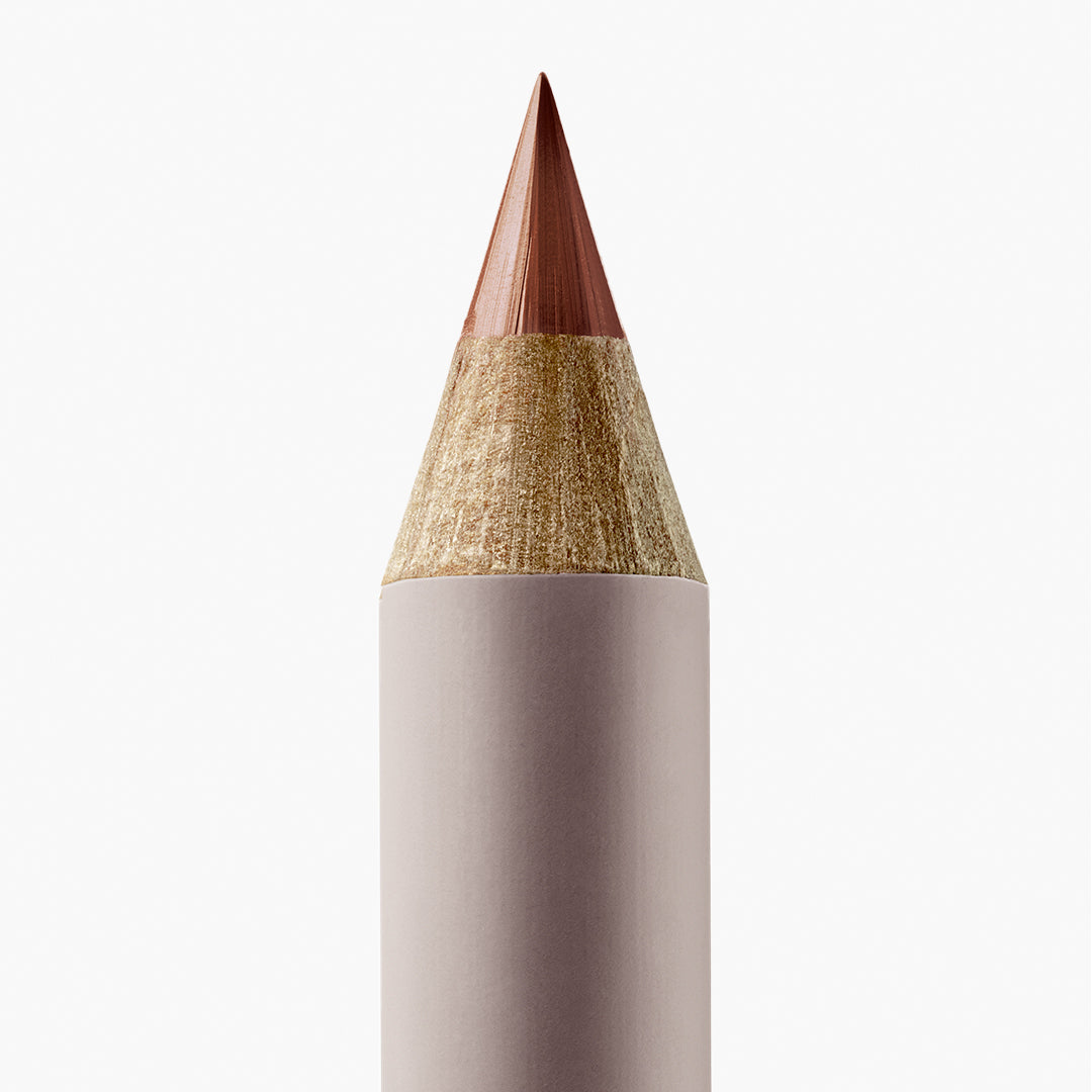 Manasi 7 | Eye and Lip Definer | Arenito Shade Image - close-up of a warm brown pencil tip