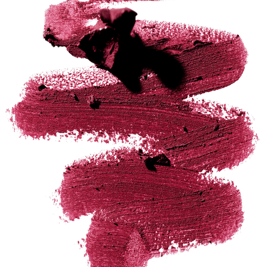 Manasi 7 | Eye and Lip Definer | Castel Swatch Image - deep berry-red pigment applied in bold, overlapping strokes on a white background, with a dense, creamy texture and softly textured edges