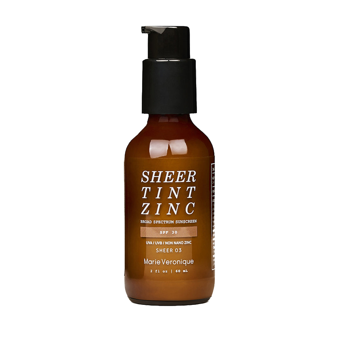 Marie Veronique | Sheer Tint Zinc SPF 30 - Sheer 3 | Product Image - amber brown color with a black pump on white background