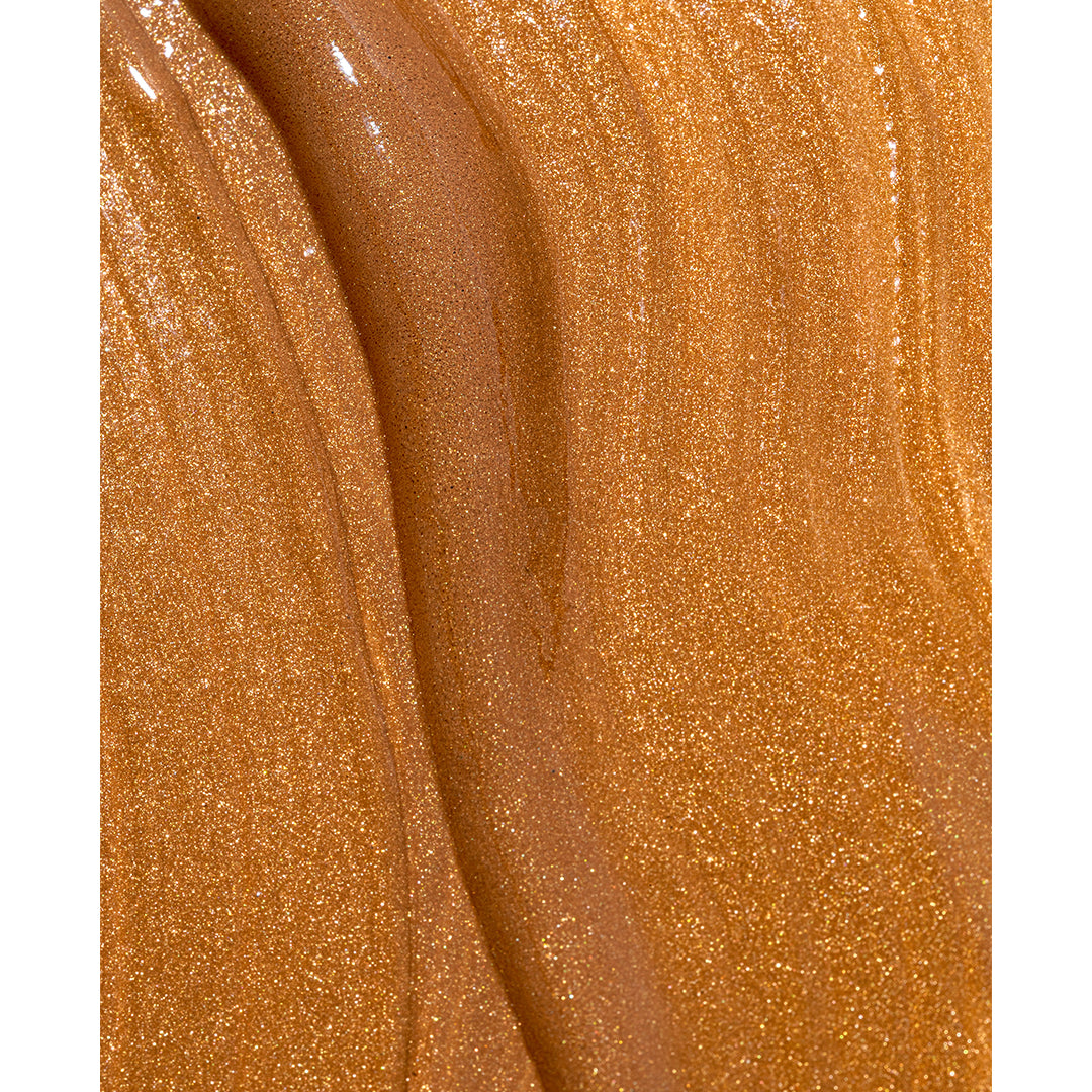 Mukti | Golden Glow Bronzing Drops | Texture Image - close-up of golden bronzing drops texture