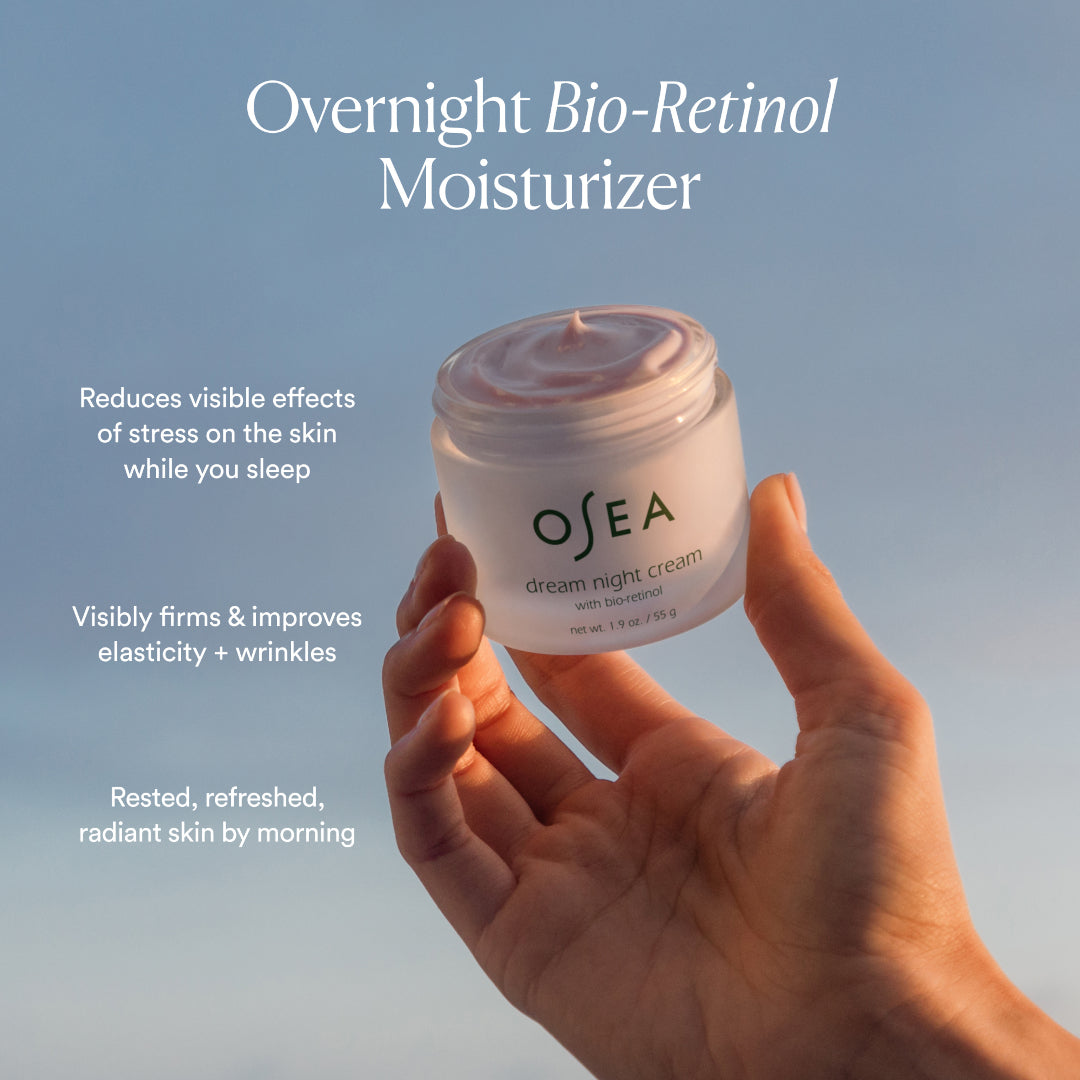 OSEA | Dream Night Cream with Bio-Retinol | Benefits Image - dand holding open jar with text highlighting overnight bio-retinol moisturizer benefits