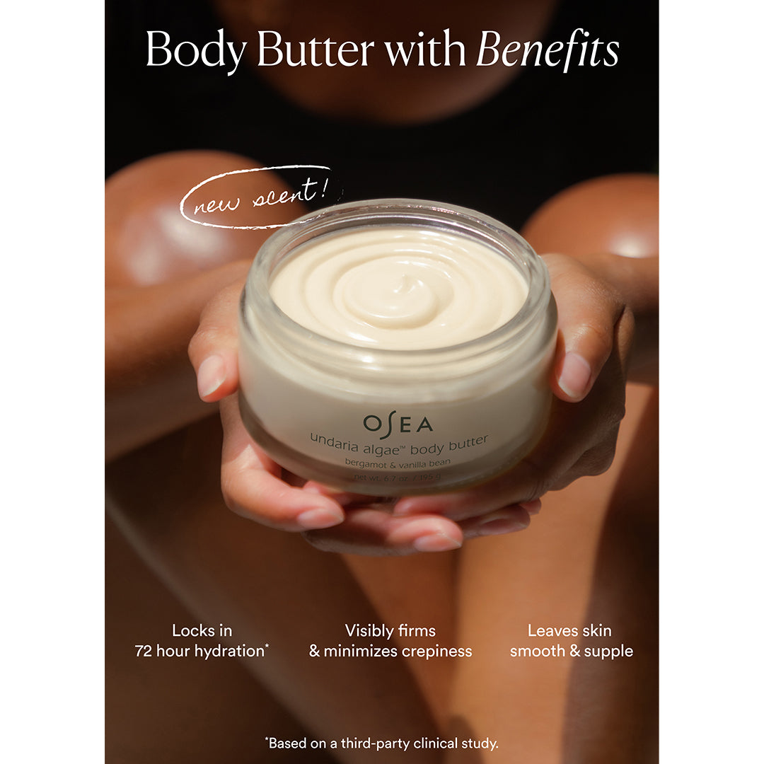 OSEA | Undaria Algae Body Butter | Benefits Image - open jar of body butter held in both hands with hydration, firming, and smoothing benefits highlighted