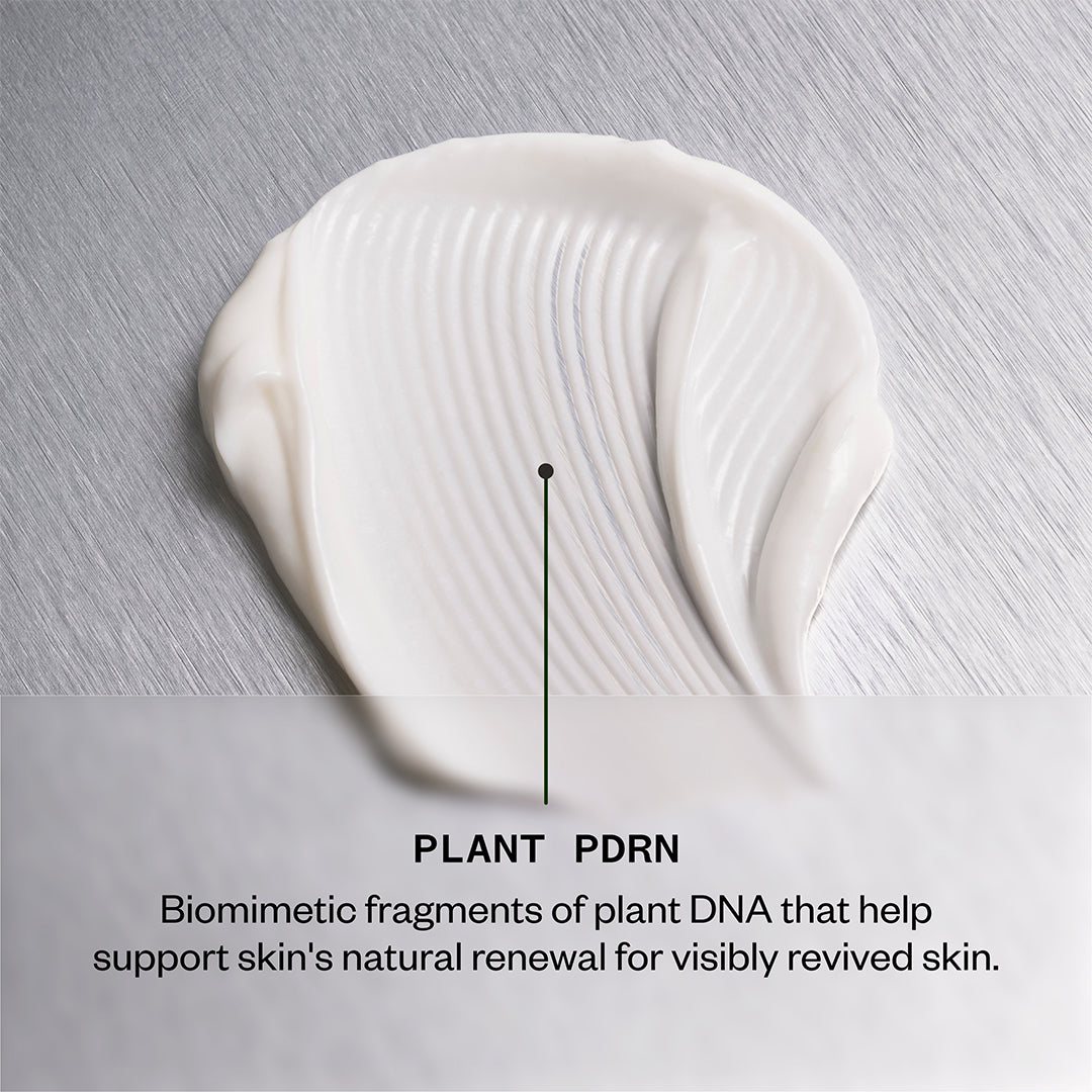Pai Skincare | Age Confidence PDRN Revival Moisturizer | Texture Image - close-up of white cream with a textured swirl on a silver background, highlighting Plant PDRN