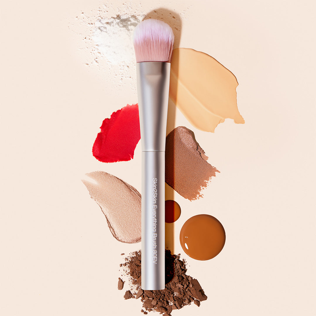 RMS Beauty | Everything Brush | Makeup Textures Image - brush surrounded by makeup textures and pigments