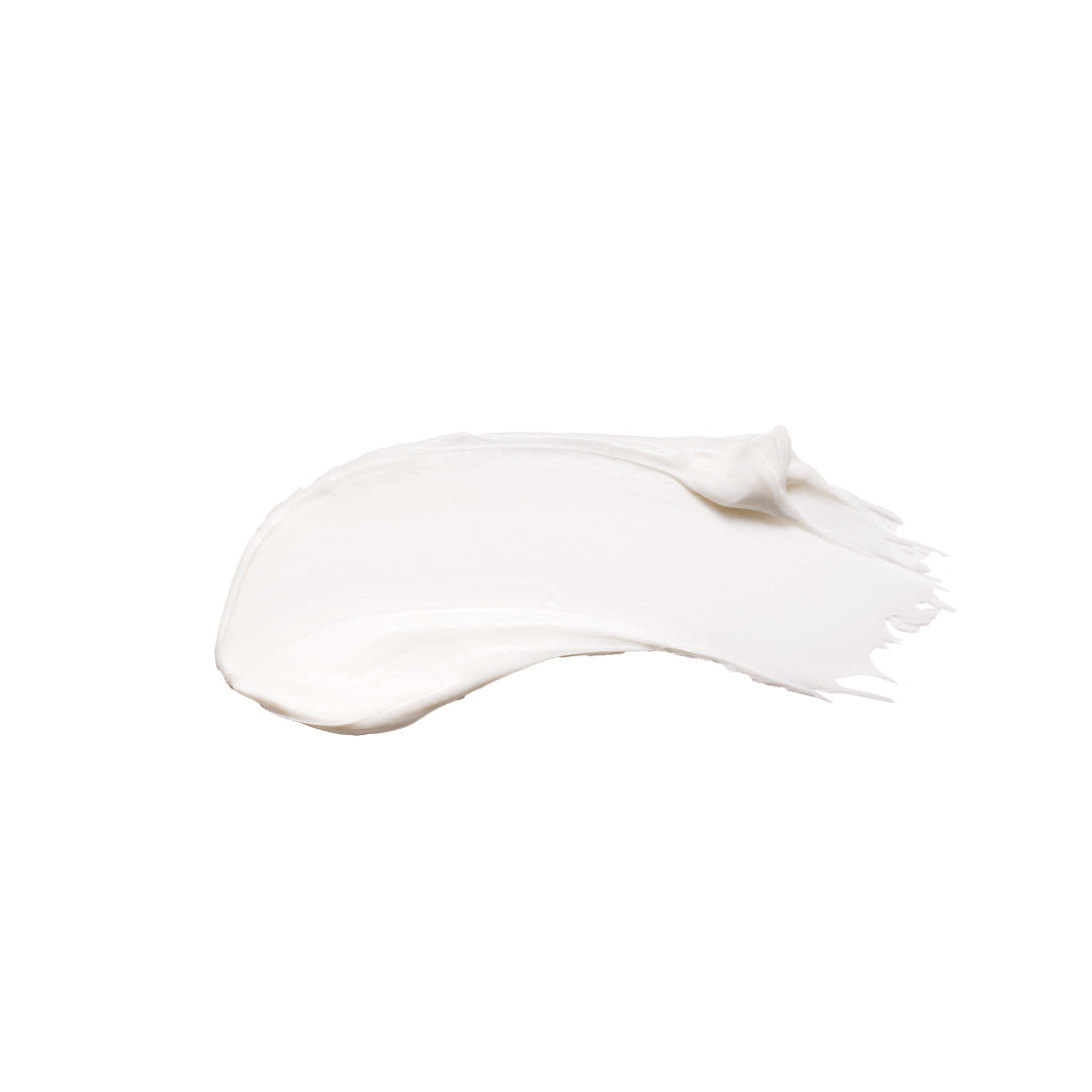 RMS Beauty | Kakadu Body Butter | Swatch Image - white body butter swatch with a smooth, whipped texture on a white background