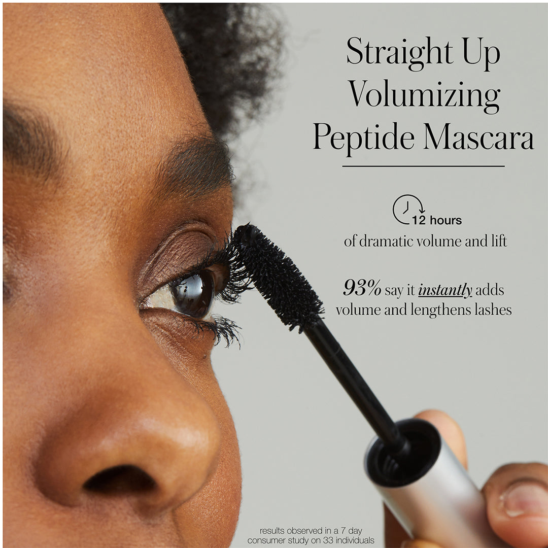 RMS Beauty | Straight Up Volumizing Peptide Mascara | Results Image - close-up of mascara being applied to lashes beside text highlighting RMS Beauty Straight Up Volumizing Peptide Mascara
