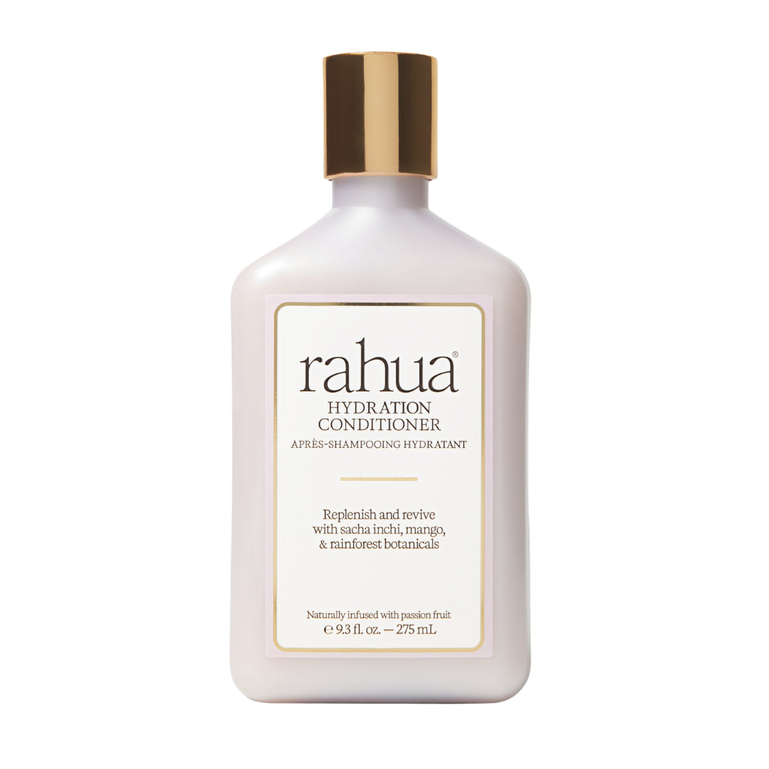 Rahua | Hydration Conditioner | Product Image - bottle with a metallic gold cap, displayed against a white background