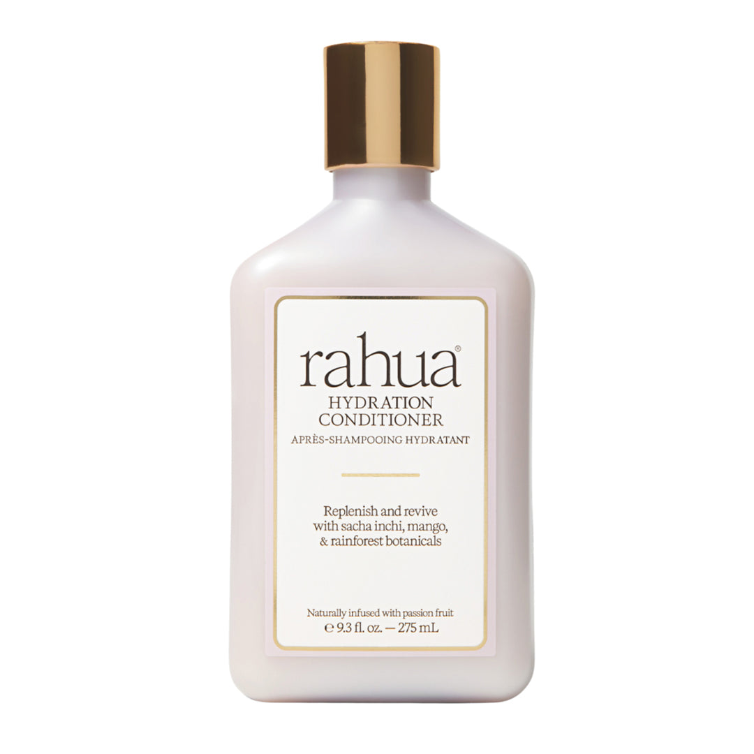 Rahua | Hydration Conditioner | Product Image - bottle with a metallic gold cap, displayed against a white background