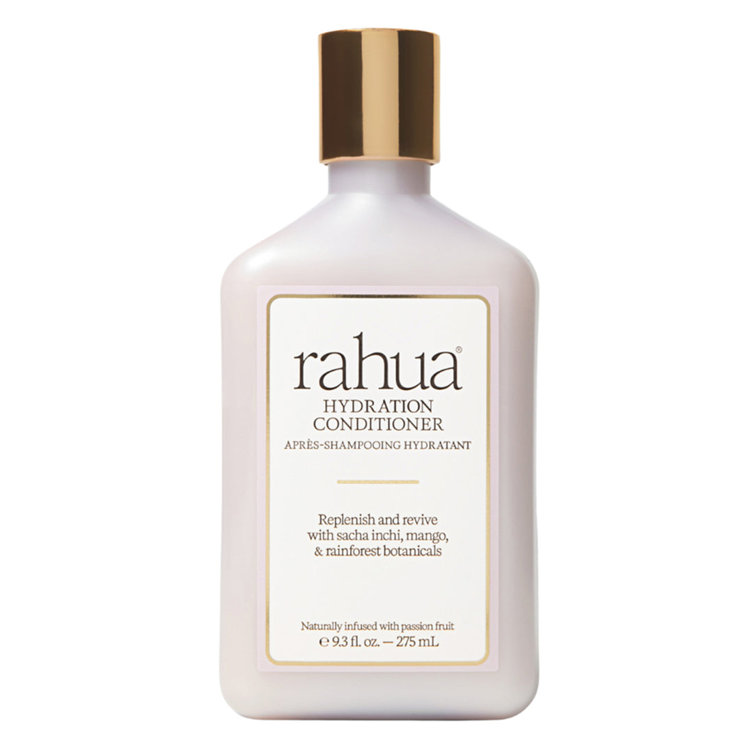 Rahua | Hydration Conditioner | Product Image - bottle with a metallic gold cap, displayed against a white background