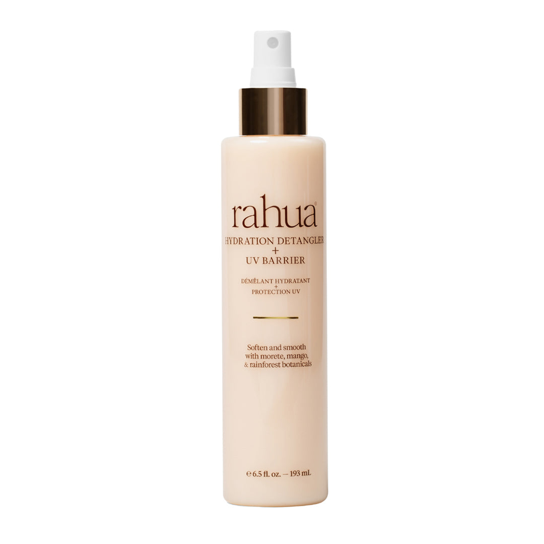 Rahua | Hydration Detangler + UV Barrier | Product Image - spray bottle with a white mist pump and metallic gold collar, displayed against a white background