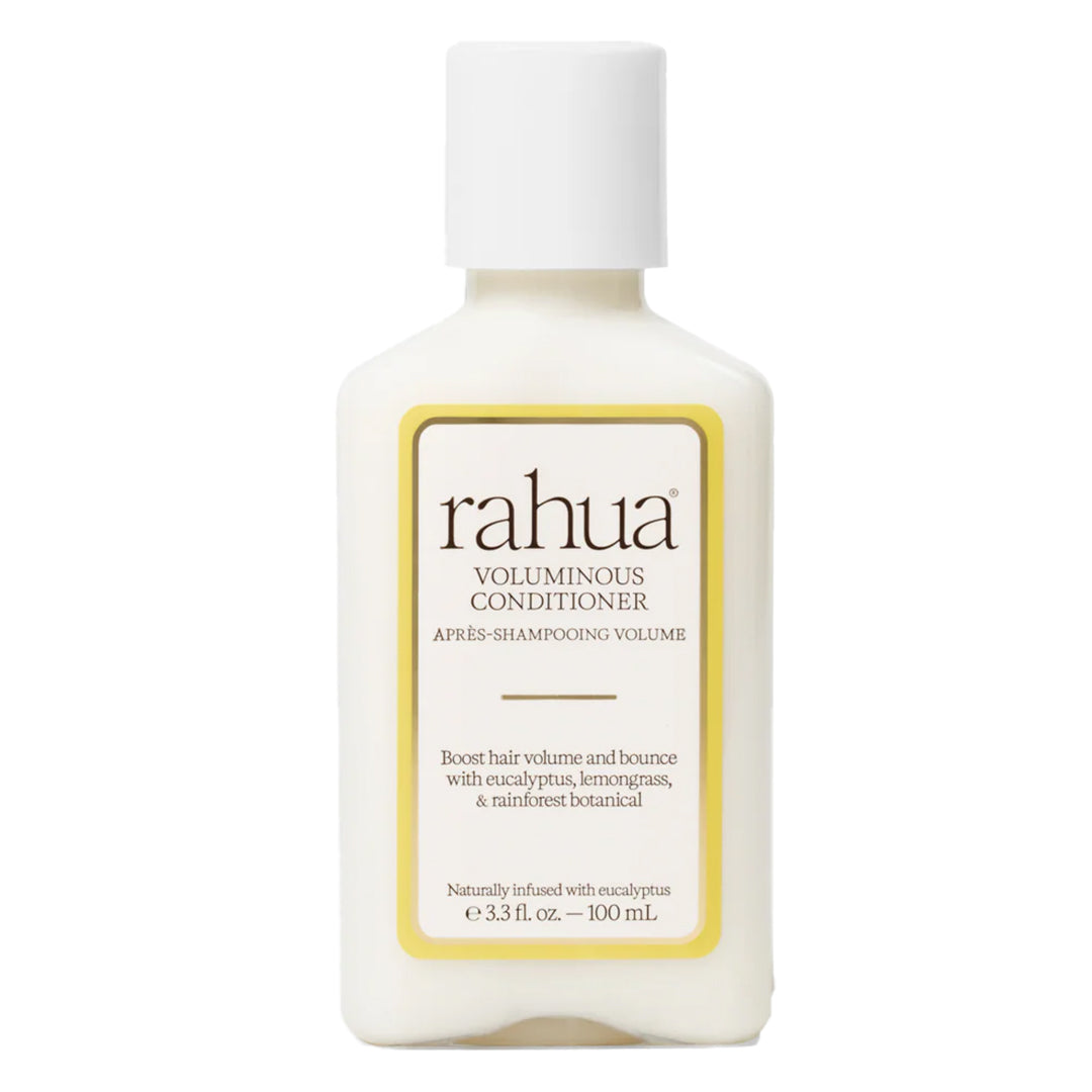 Rahua | Voluminous Conditioner 100 ml | Product Image - clear bottle filled with cream-colored conditioner and a white cap on a white background