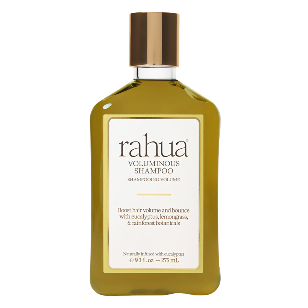 Rahua | Voluminous Shampoo | Product Image - golden bottle with a metallic gold cap, displayed against a white background