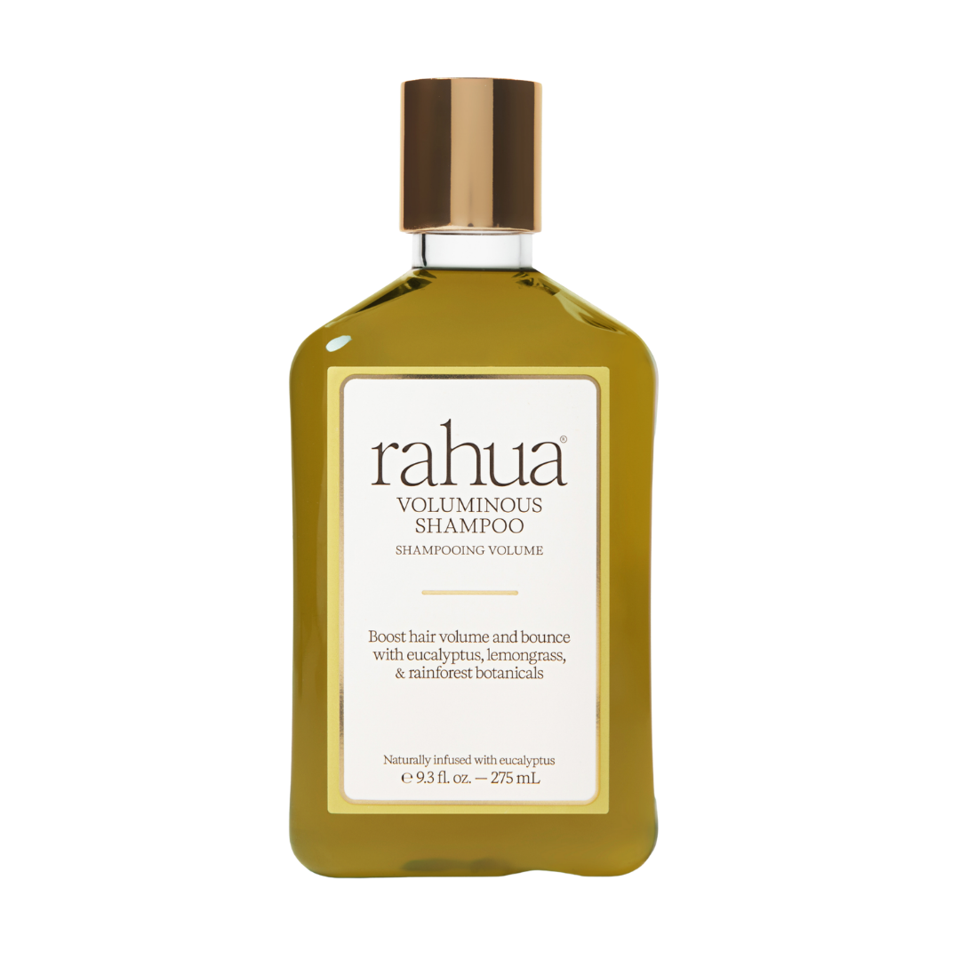 Rahua | Voluminous Shampoo | Product Image - golden bottle with a metallic gold cap, displayed against a white background