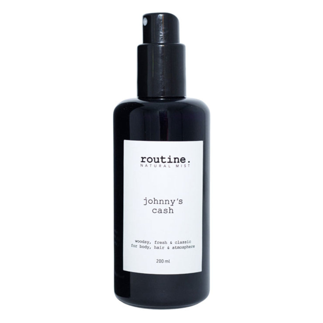 Routine | Body, Hair & Atmosphere Mist - Johnny's Cash | Product Image - black glass packaging with white label shown on a white background