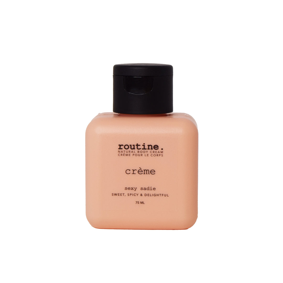 Routine | Natural Body Cream - Sexy Sadie | Travel Mini Product Image - mini bottle with black cap shown on a white background