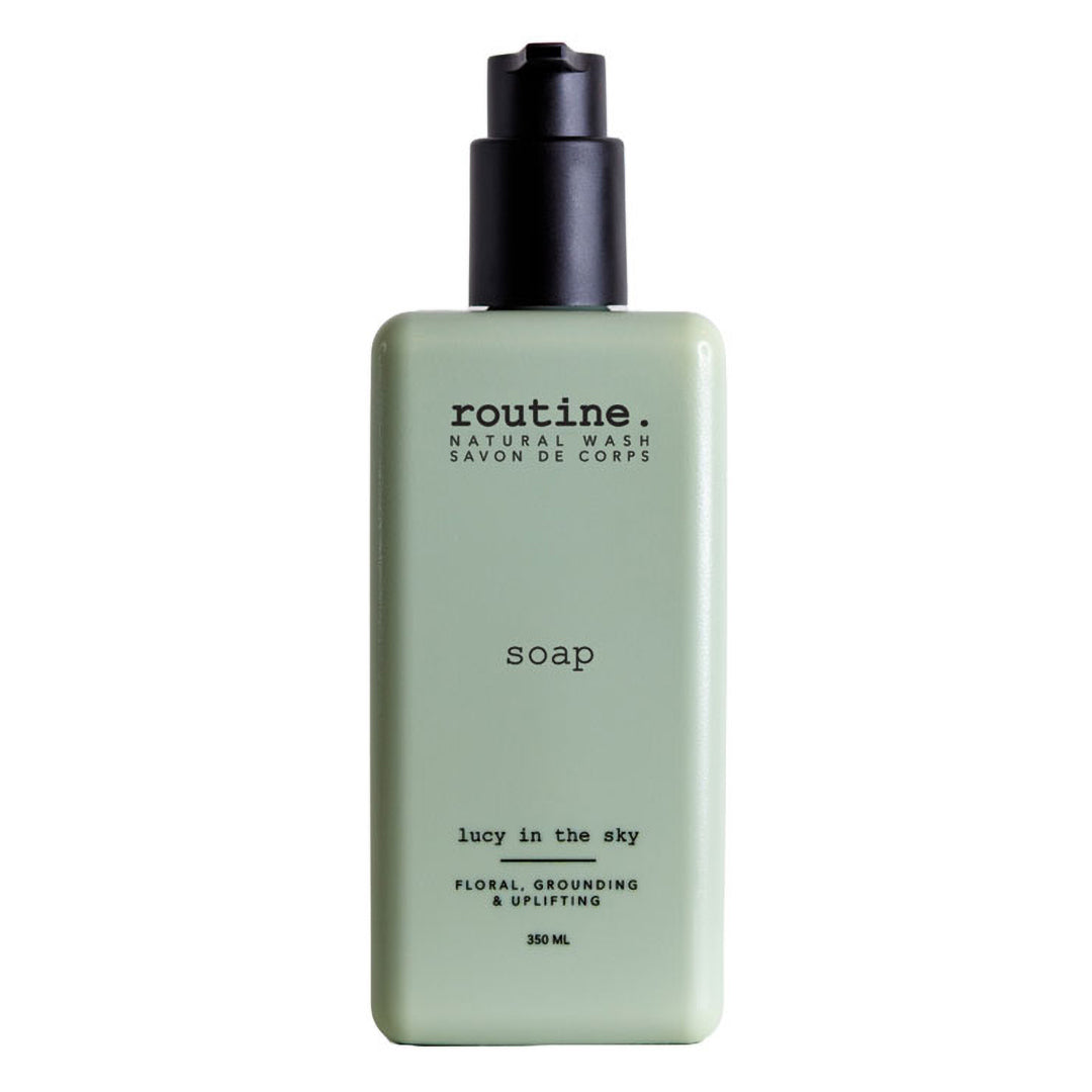 Routine | Natural Hand & Body Wash - Lucy in the Sky | Product Image - green bottle with black pump dispenser on a white background