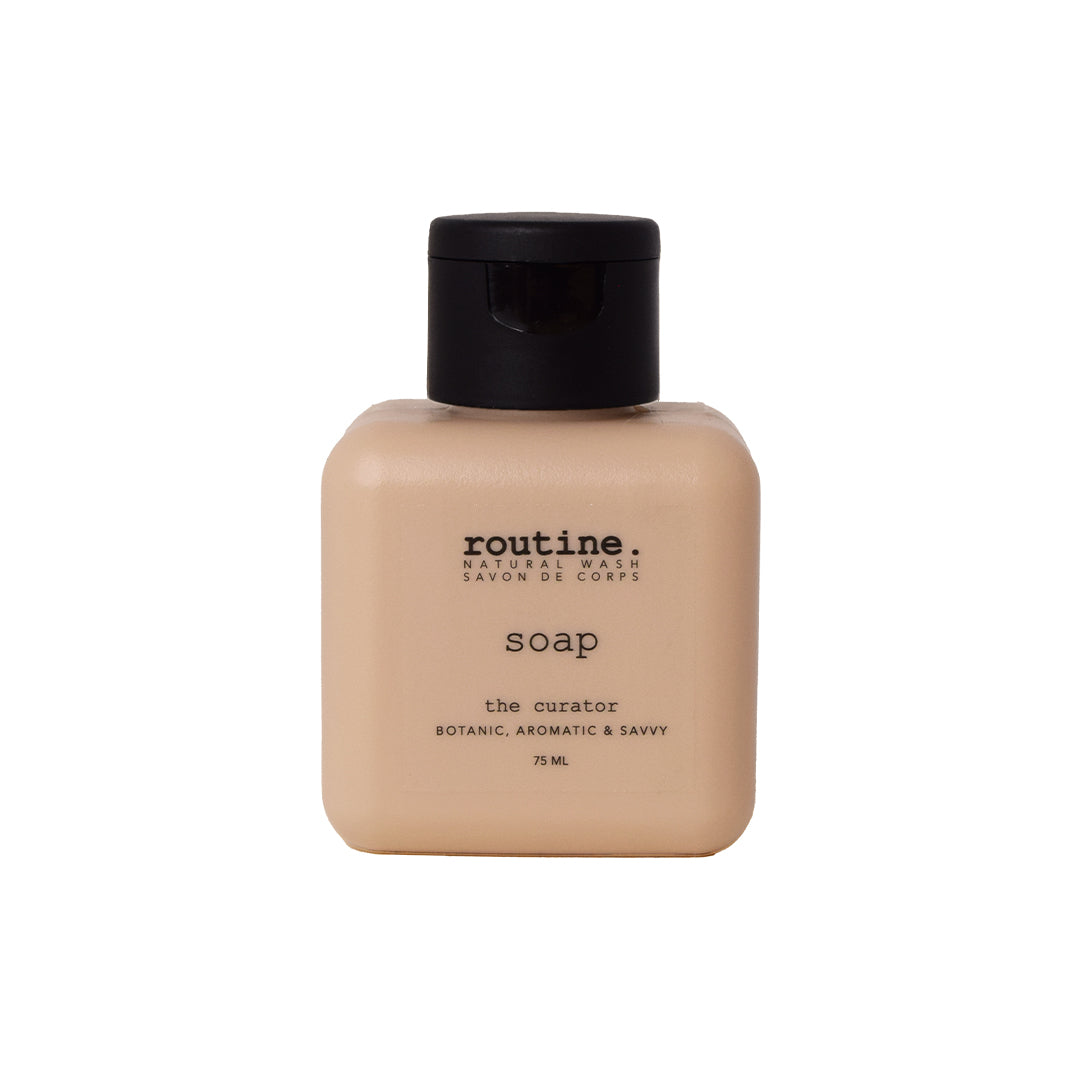 Routine | Natural Hand & Body Wash
- The Curator | Travel Mini Product Image - mini bottle with black cap shown on a white background