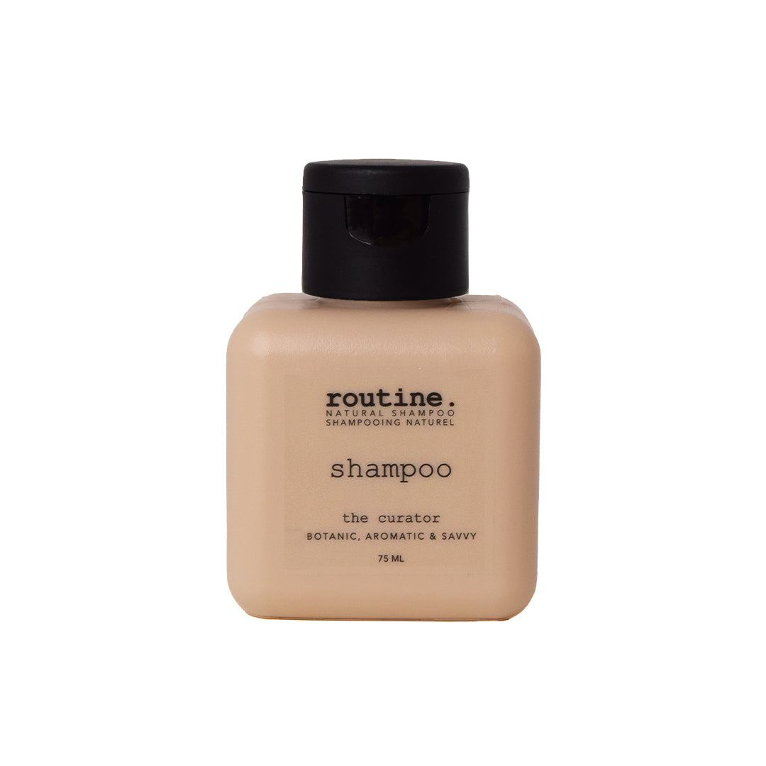 Routine | Shampoo - The Curator | Travel Mini Product Image - mini bottle with black cap shown on a white background
