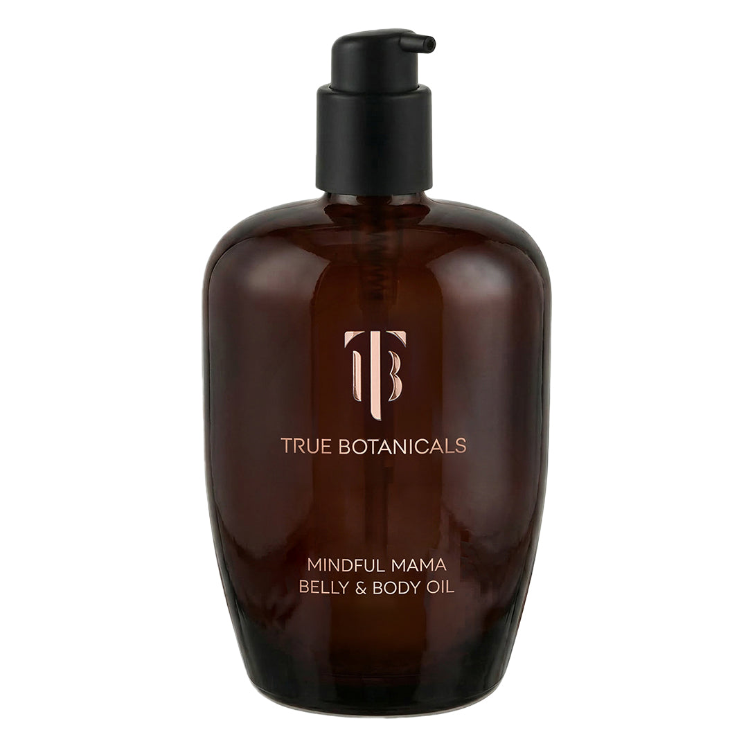 True Botanicals | Mindful Mama Belly & Body Oil | Product Image - amber glass bottle with a black pump on a white background