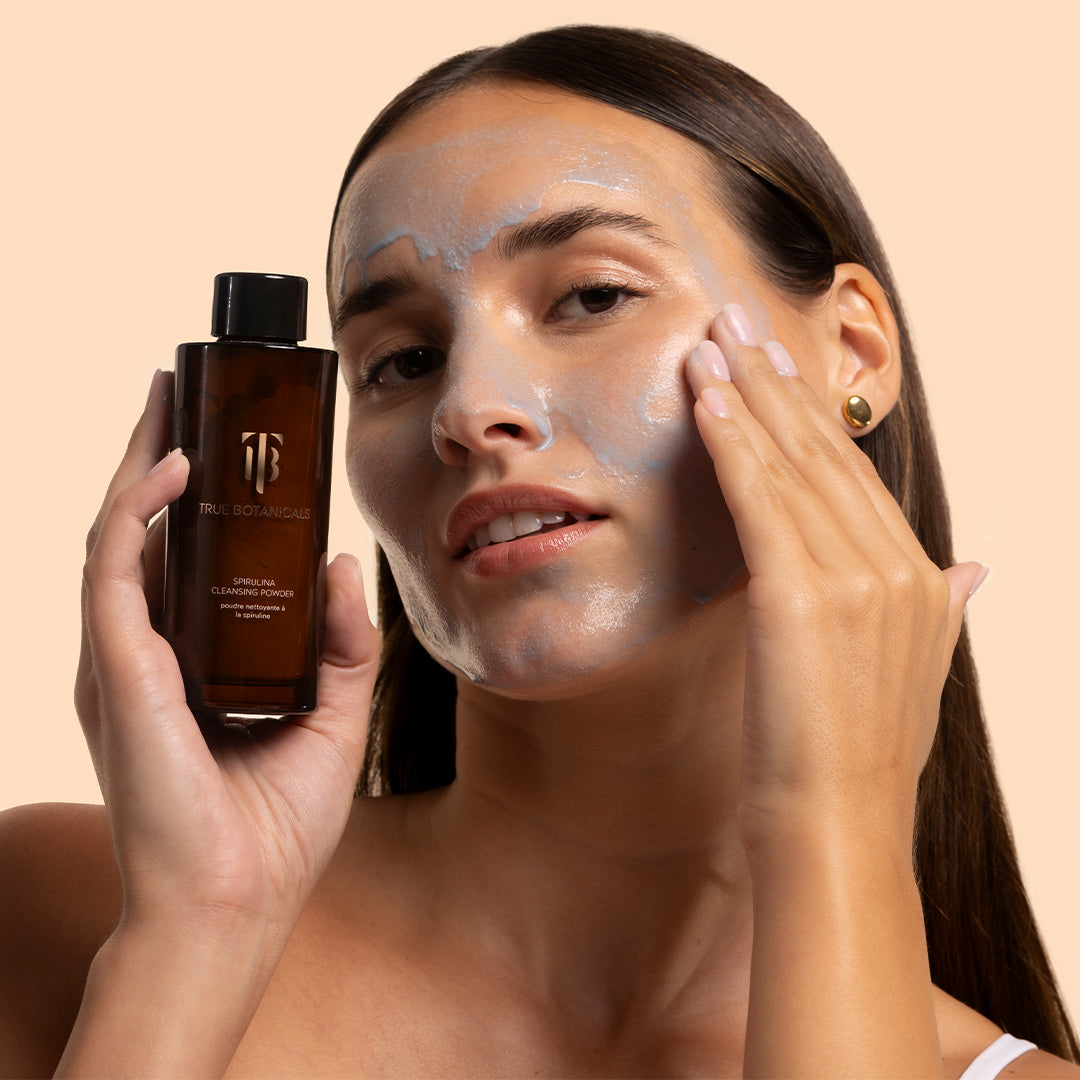 True Botanicals | Spirulina Cleansing Powder | Model Image_Oct26 - Woman applying cleansing powder to her face