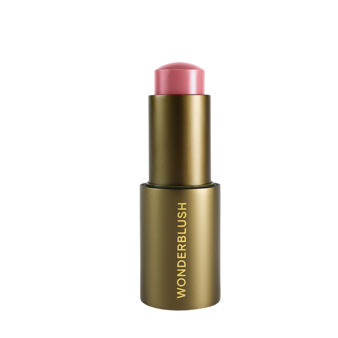 Wonderblush | Le Fondant Cream Blush | Camélia Shade Product Image - blush stick in metallic gold packaging on a white background