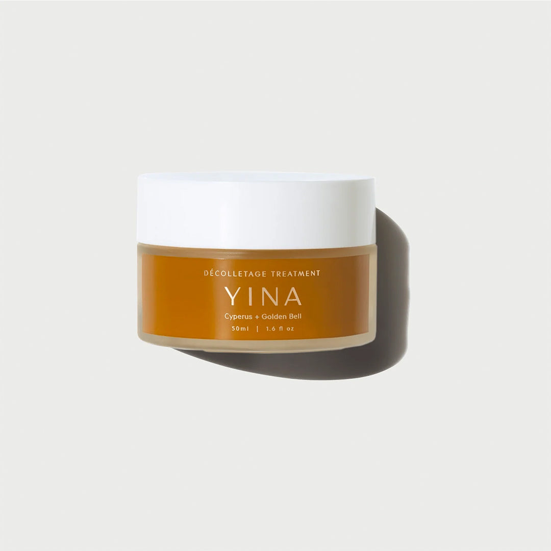 YINA | Décolletage Treatment For Neck, Chest, and Breasts | Jar Image - jar with a white lid against a white background