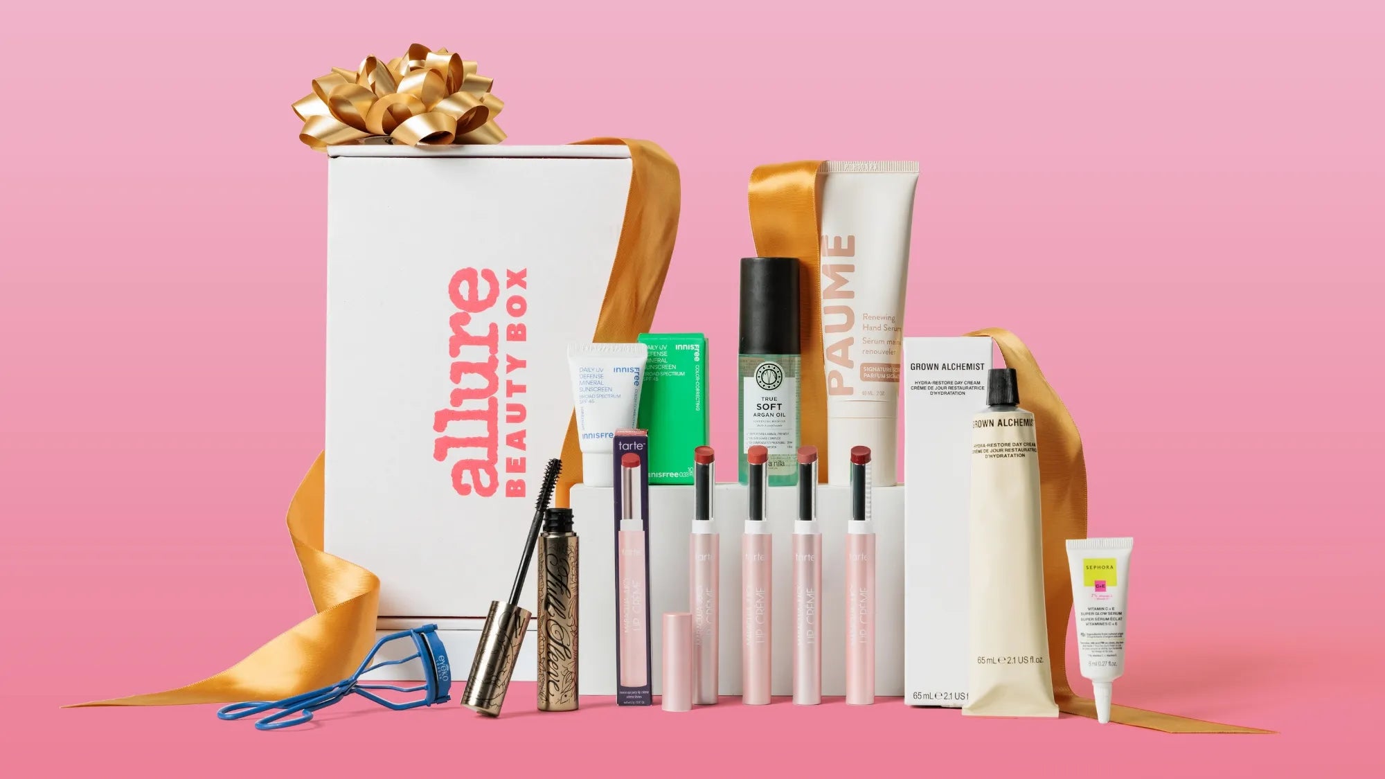 Allure Beauty Box with curated skincare and makeup products arranged as a festive gift set.