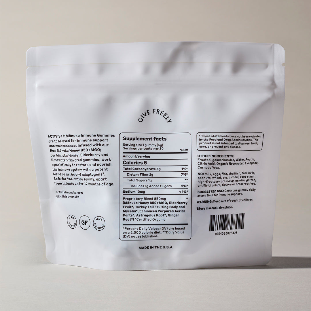 Activist Mānuka | Immune Gummies 850+ MGO | Supplement Facts Image - white pouch on a beige background