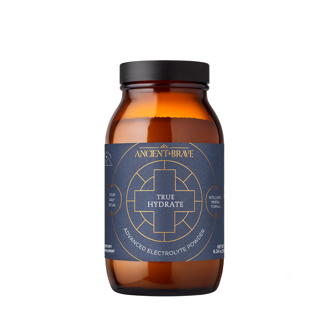 Ancient + Brave | True Hydrate | Product Image - amber glass jar with black lid on a white background