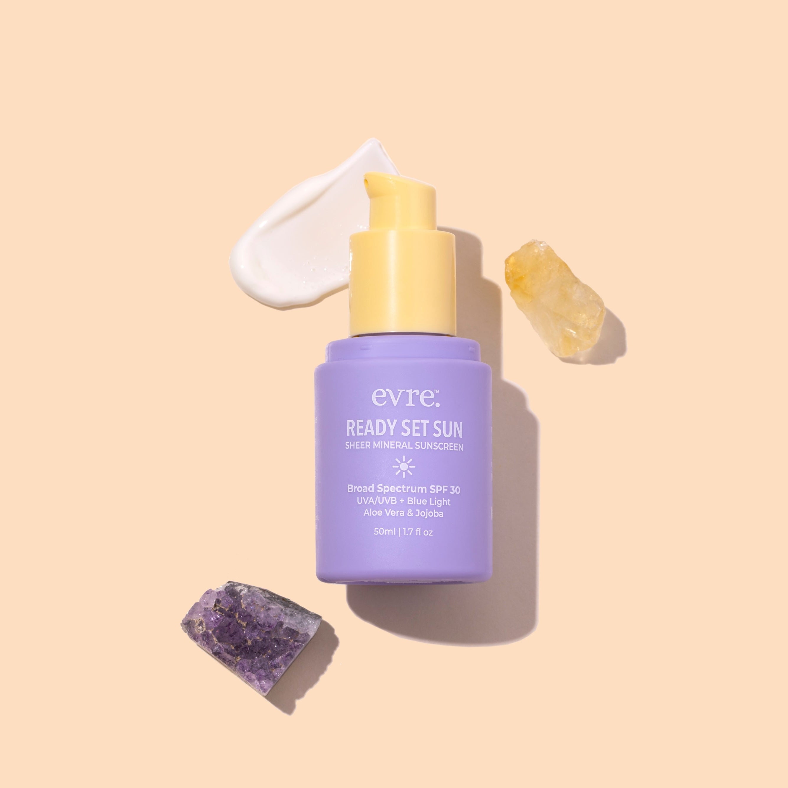 Evre | Ready Set Sun SPF 30 | Styled image flat lay with swatch on peach background