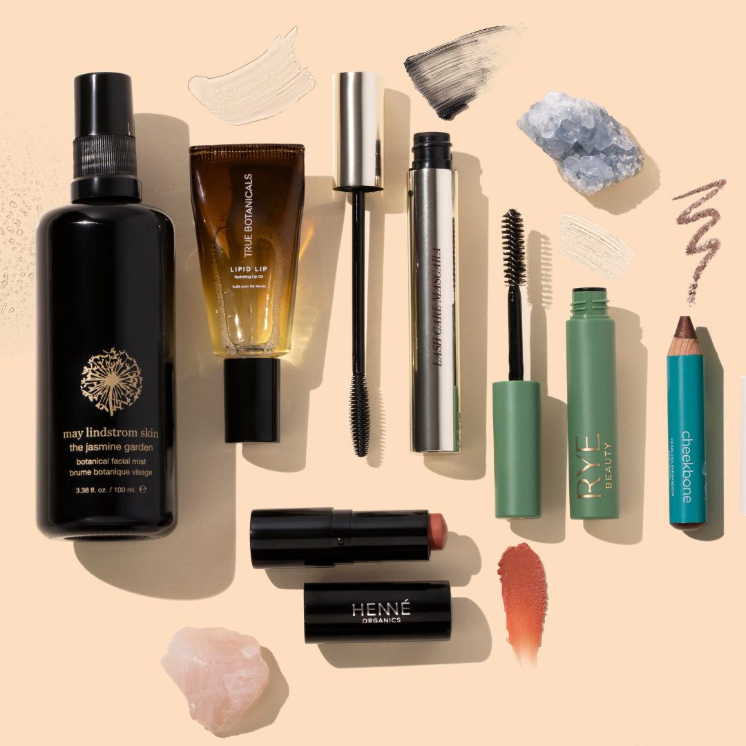 Beauty Heroes | Limited Edition Fall Makeup Discovery | Product Image2 - collection featuring assorted makeup and beauty products on a peach background 
