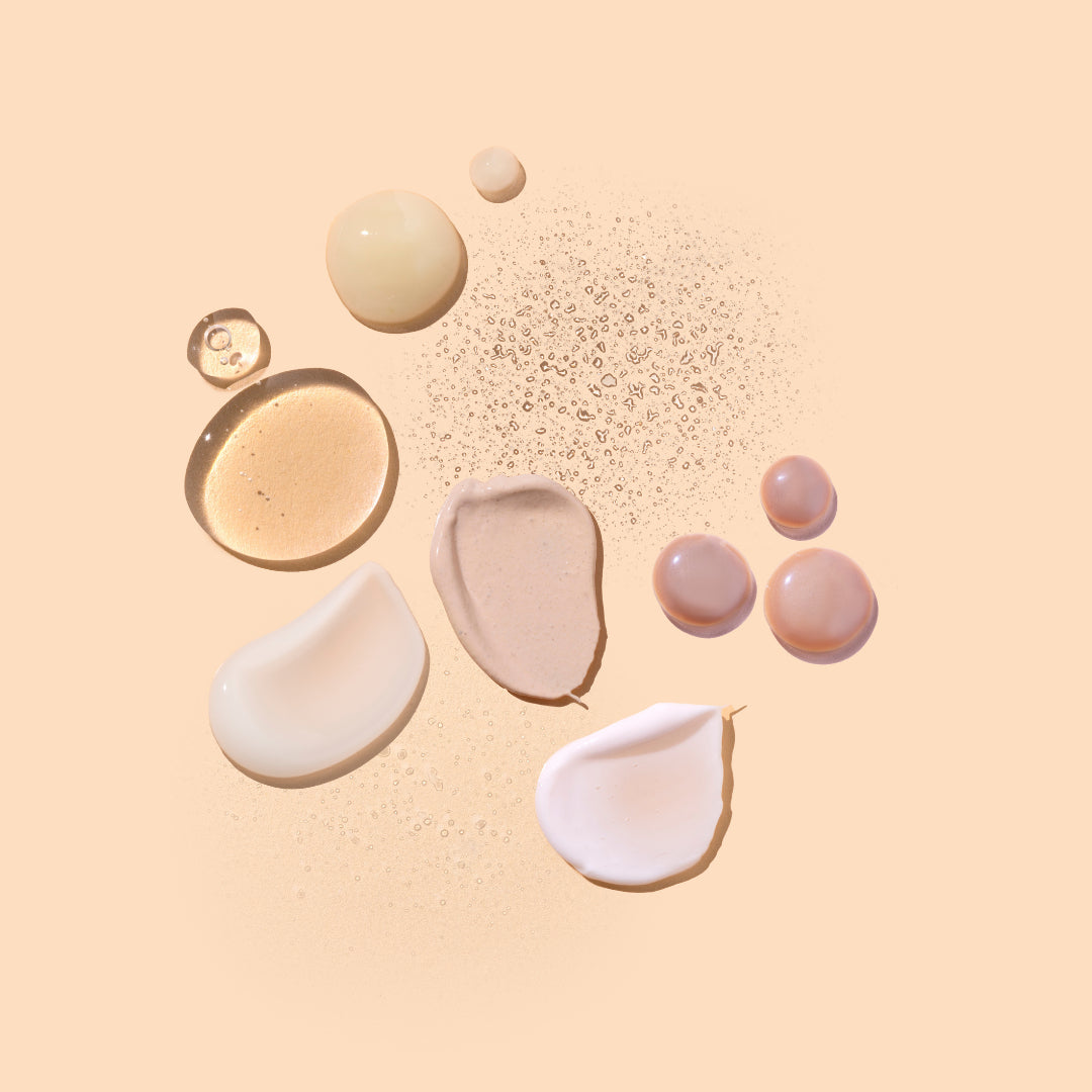 Beauty Heroes | The Summer Edit | Group Swatch Image - assorted skincare textures, including creams, oils, serums, and gel swatches, arranged on a beige background