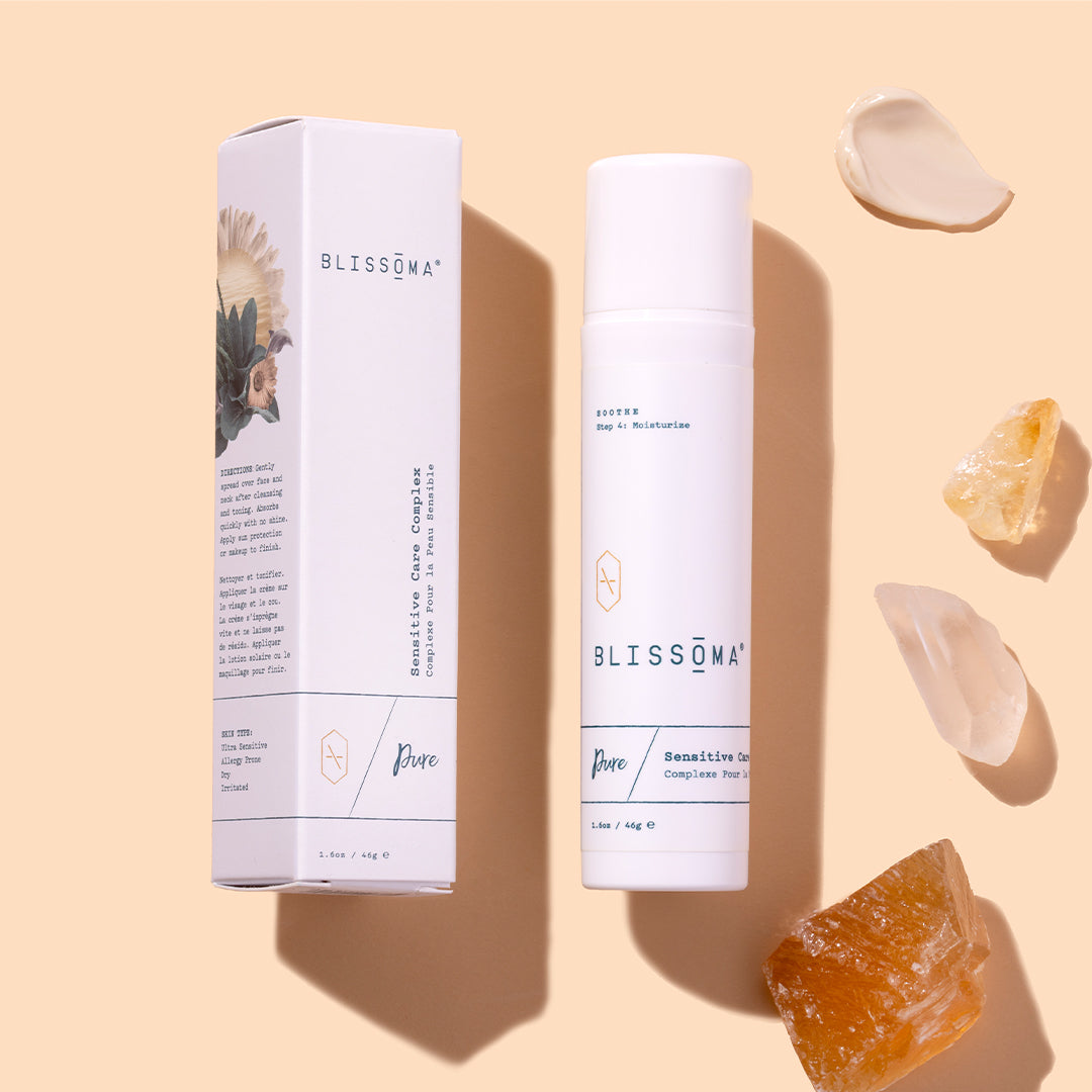 Blissoma | Pure Sensitive Care Complex | Product Image with Swatch - packaging and product bottle displayed alongside crystals and cream swatch