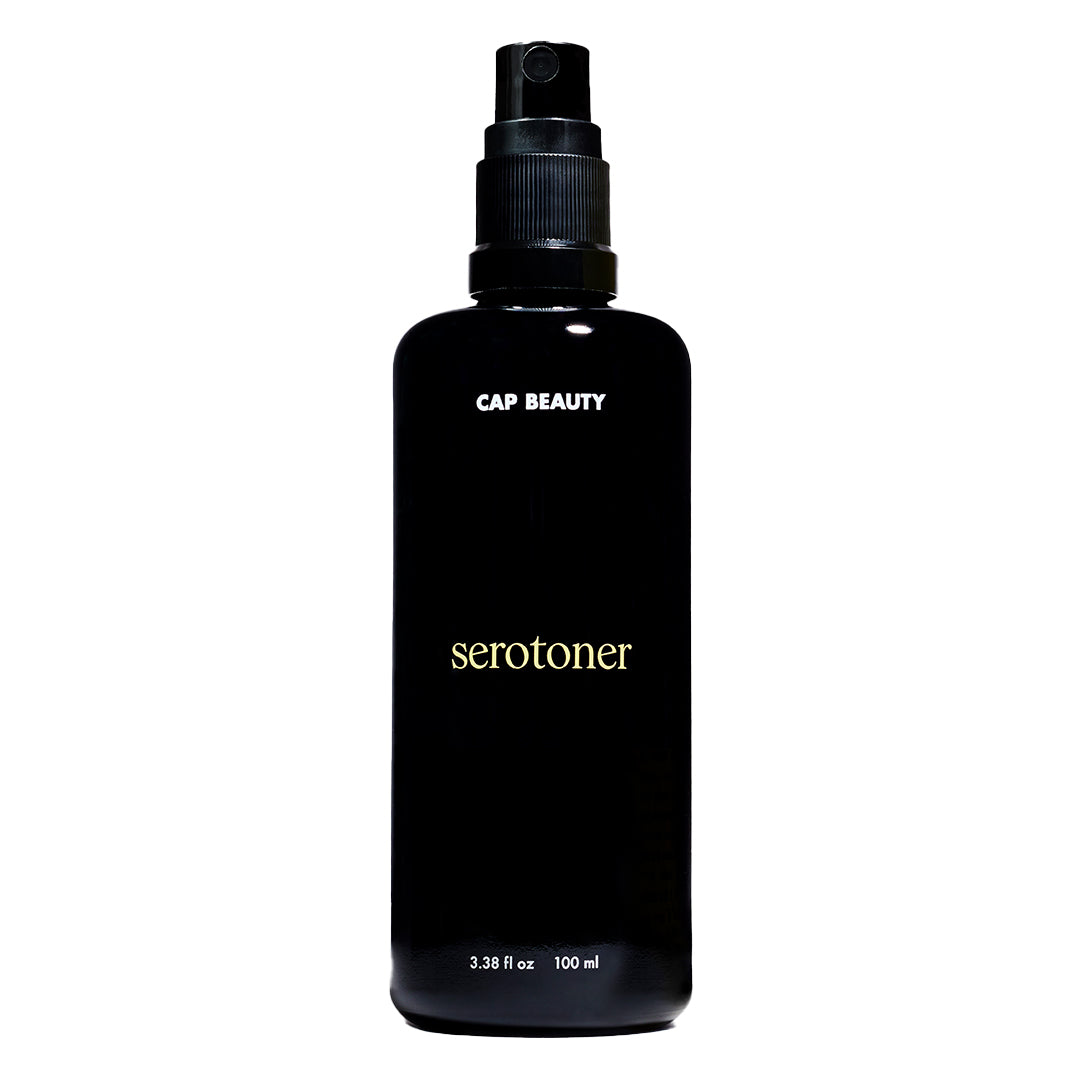 CAP Beauty | Serotoner | Product Image - black spray bottle on a white background