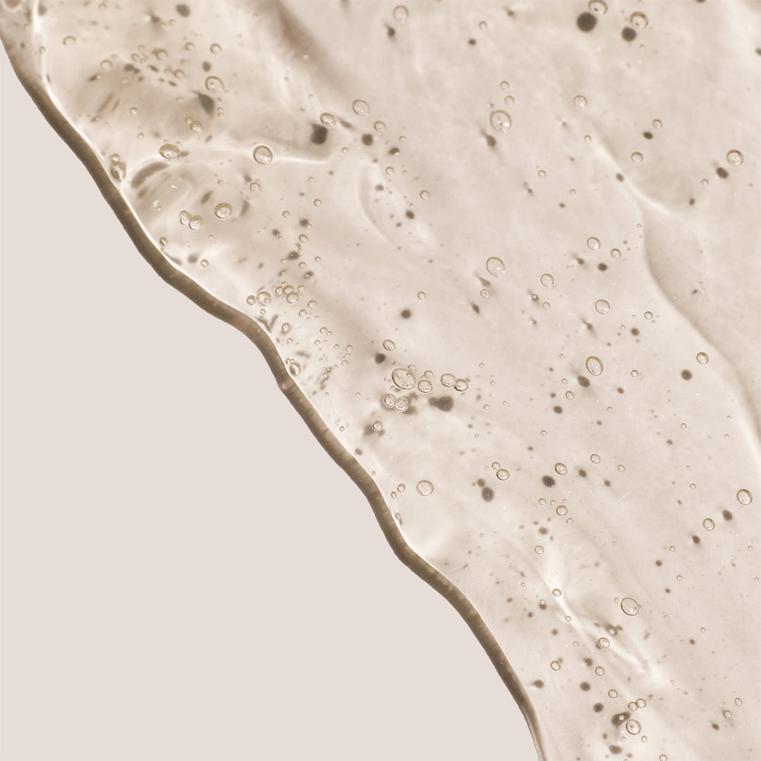 Doctor Rogers | Face Wash | Texture Image - close-up of gel texture on a light beige background