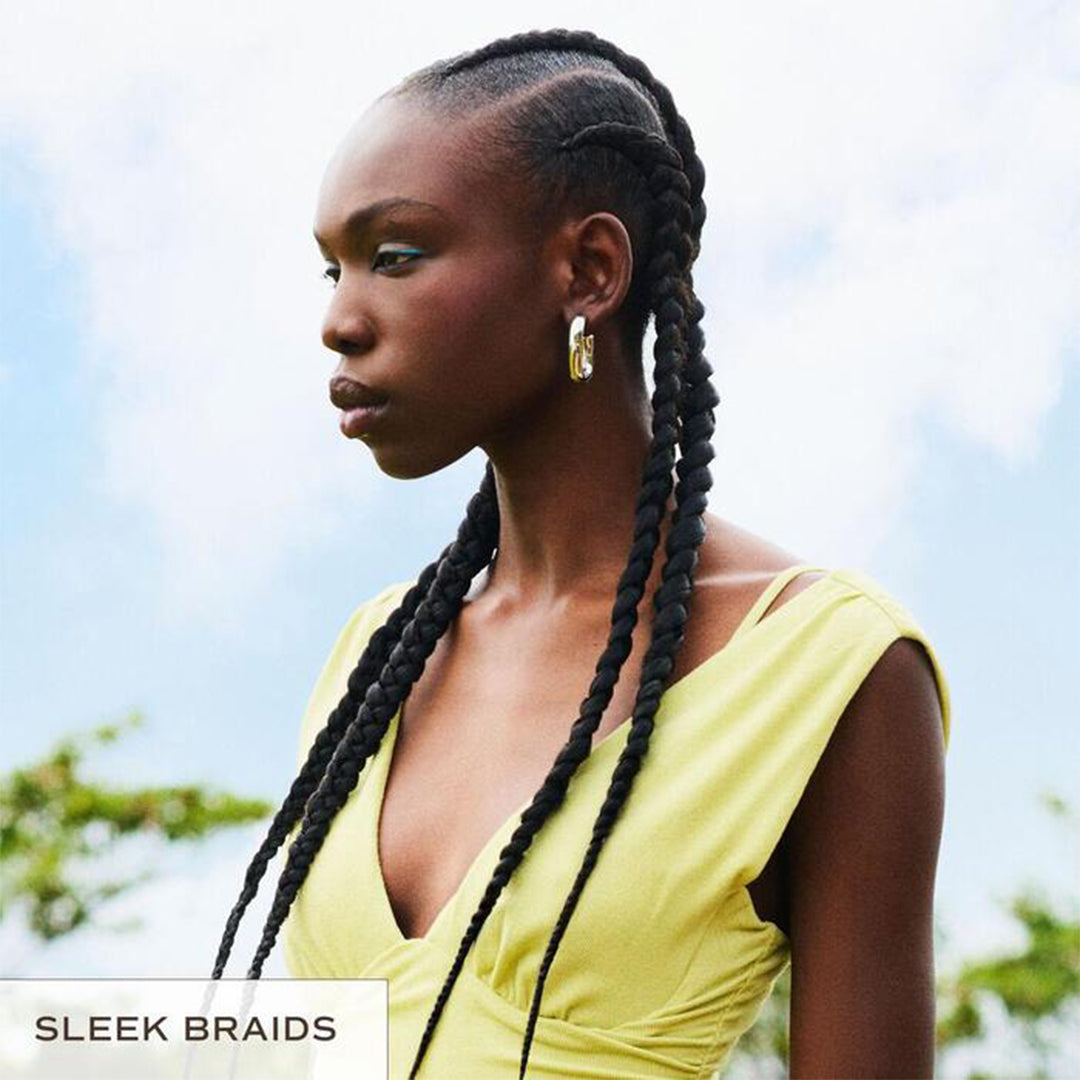 Innersense Organic Beauty | Inner Reflection Sculpting Pomade | Model Image 1 - model with long sleek braided hairstyle
