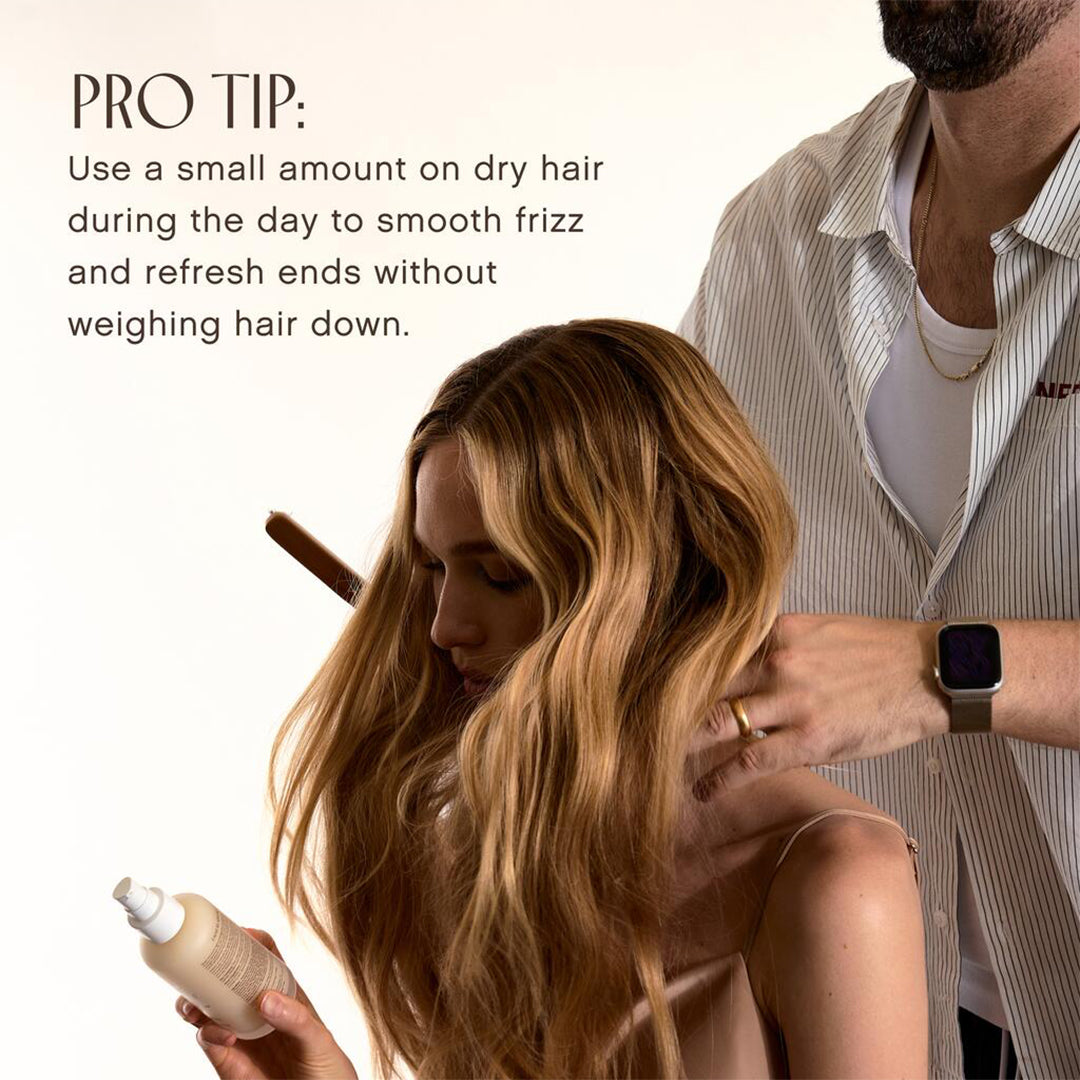 Innersense Organic Beauty | Overnight Repair Serum | Pro-tip Image - model holding Innersense bottle with styling tip to smooth frizz and refresh dry ends during the day