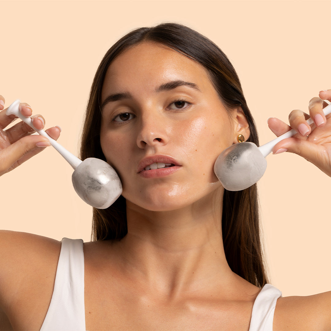 LILFOX | Chill Wands | Model Image_Oct26 - woman holding facial globes against her cheeks