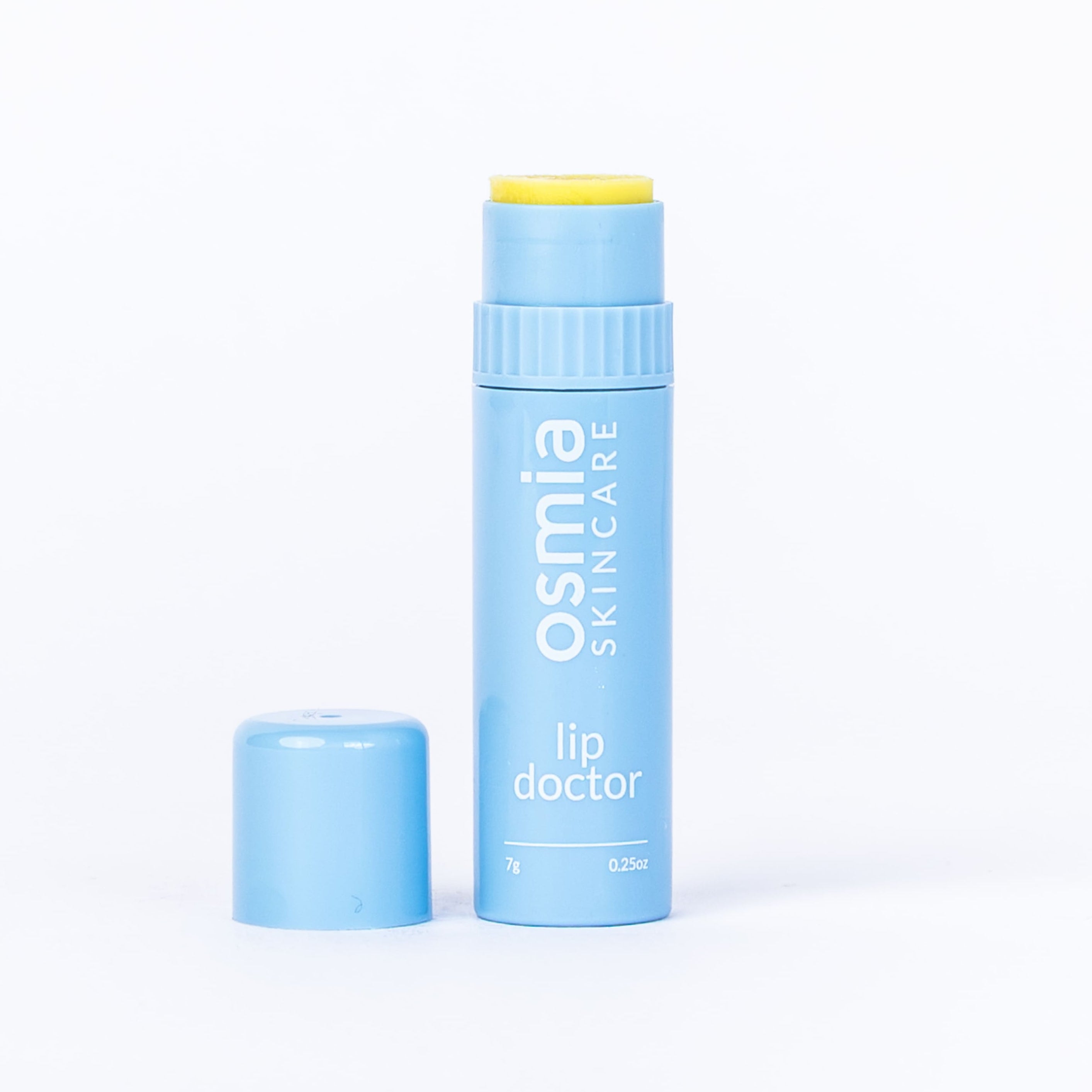 Blue lip balm with yellow cap on a white background