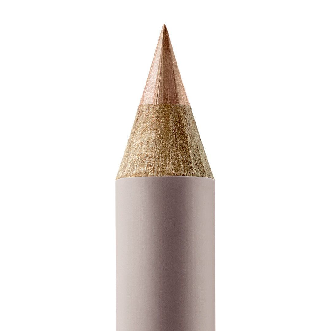 Manasi 7 | Eye and Lip Definer | Citrino Shade Image - close-up of a shimmering champagne pencil tip