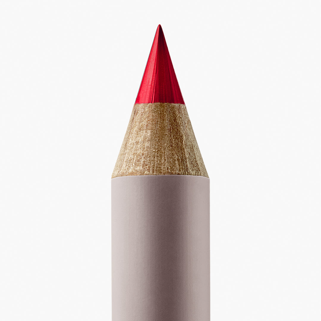 Manasi 7 | Eye and Lip Definer | Macao Shade Image - close-up of a vibrant red pencil tip