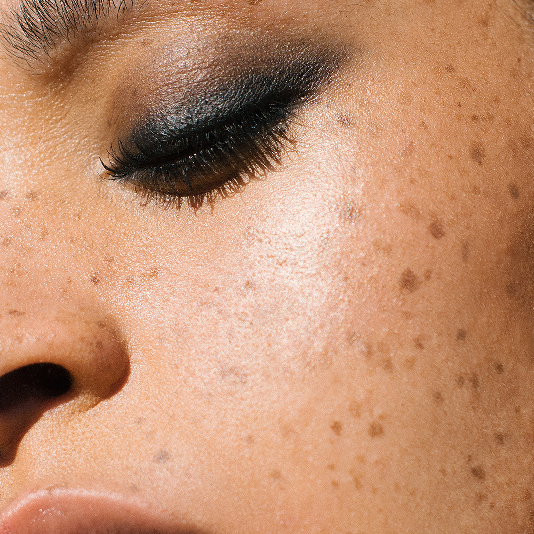 Manasi 7 | Precision Mascara Obsidian | Model Image - close-up of an eye wearing smoky black eye makeup and defined lashes