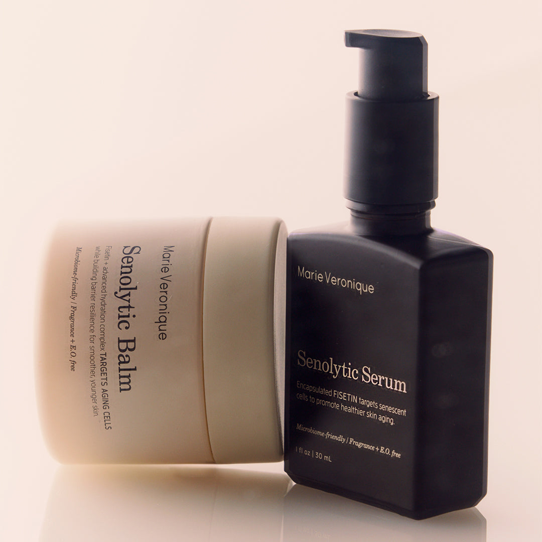 Marie Veronique | Senolytic Balm & Senolytic Serum | Styled Image - balm and serum displayed together against a warm neutral background