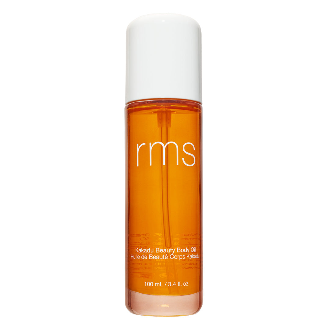 RMS Beauty | Kakadu Body Oil | Product Image - amber bottle with a white cap on a white background