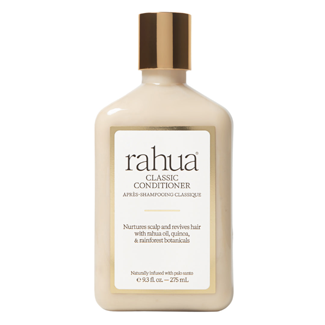Rahua | Classic Conditioner | Product Image - bottle with a metallic gold cap on a white background