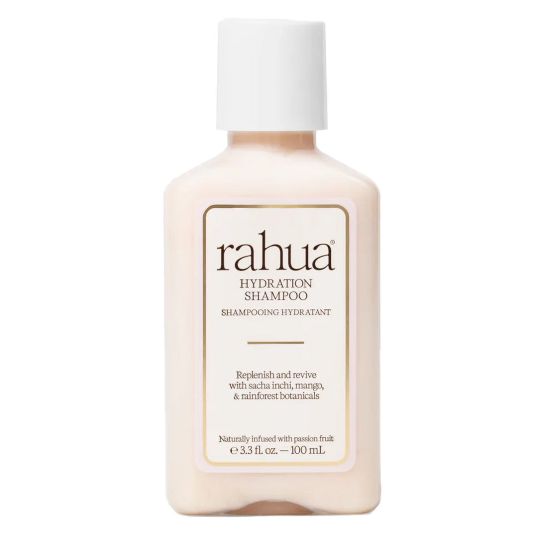 Rahua | Hydration Shampoo 100 ml | Product Image - clear bottle filled with cream-colored shampoo and a white cap on a white background