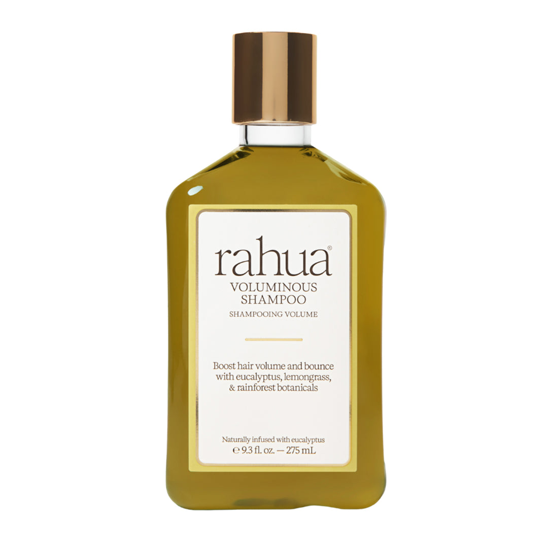 Rahua | Voluminous Shampoo | Product Image - golden bottle with a metallic gold cap, displayed against a white background